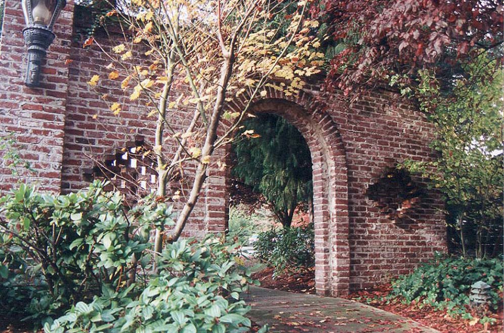 Arched Brick Wall and Passage