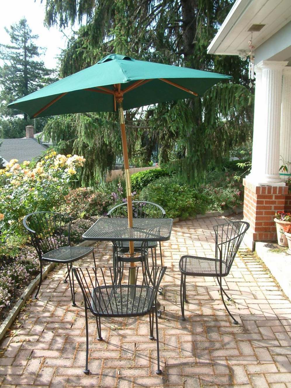 Blue Green Umbrella and Furniture